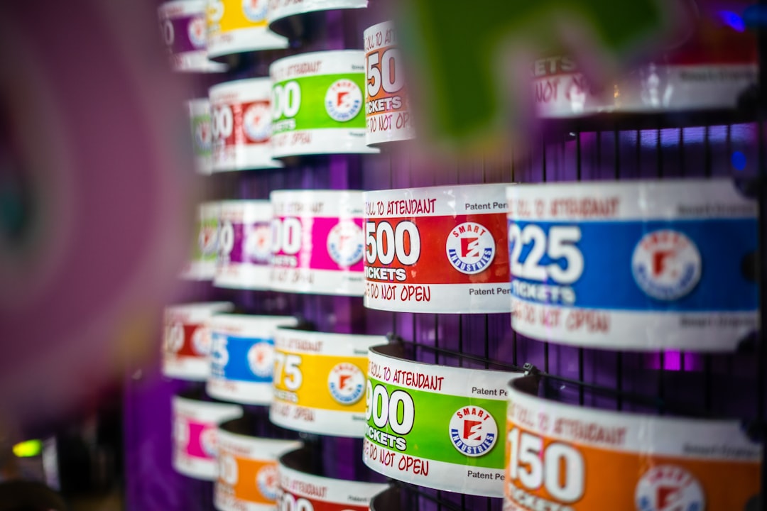 a close up of many different colored labels on a wall