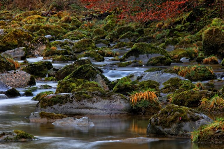 high definition photo of flowing river on rocky mountain